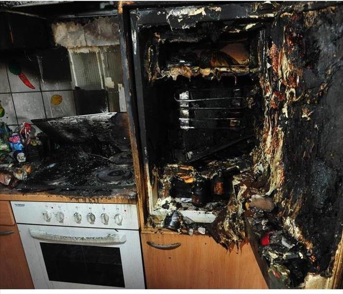 Burned kitchen after fire caused by cigarettes